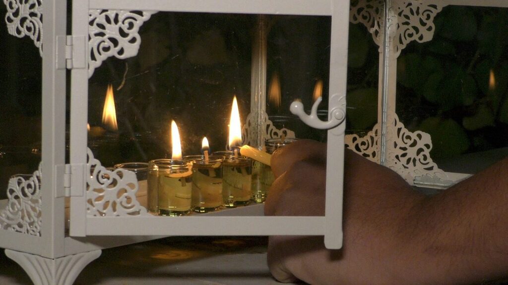 A candle lighting ceremony in Pisgat Ze'ev, Dec. 13, 2020 