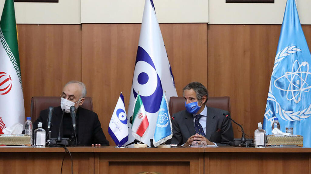  Head of Iran's Atomic Energy Organization Ali-Akbar Salehi and International Atomic Energy Agency (IAEA) Director General Rafael Grossi