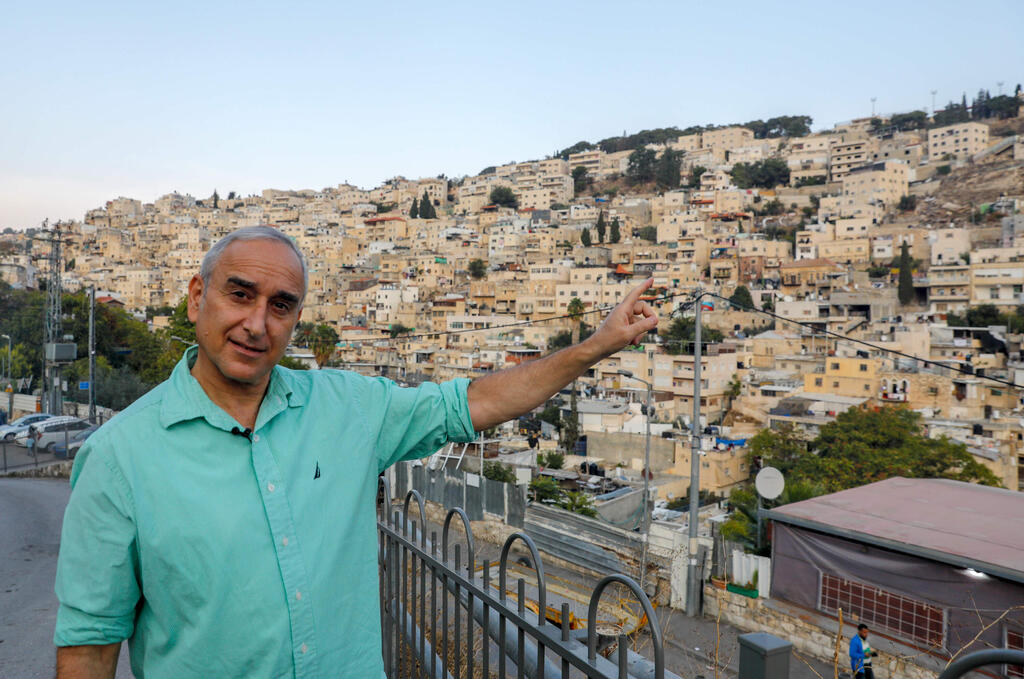 Daniel Luria, the head of the Jewish settler organization Ateret Cohanim, speaks to an AFP journalist in east Jerusalem