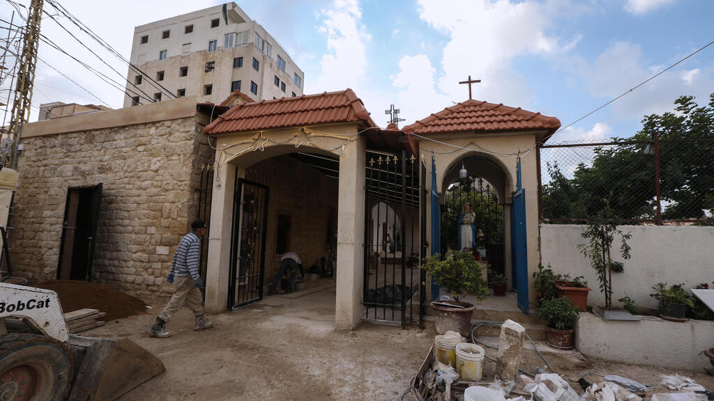 olunteers are working on the Rebuilding Restoration of the Our Lady of Deliverance Church, which was damaged by the 04 August explosion in Beirut Port, Lebanon