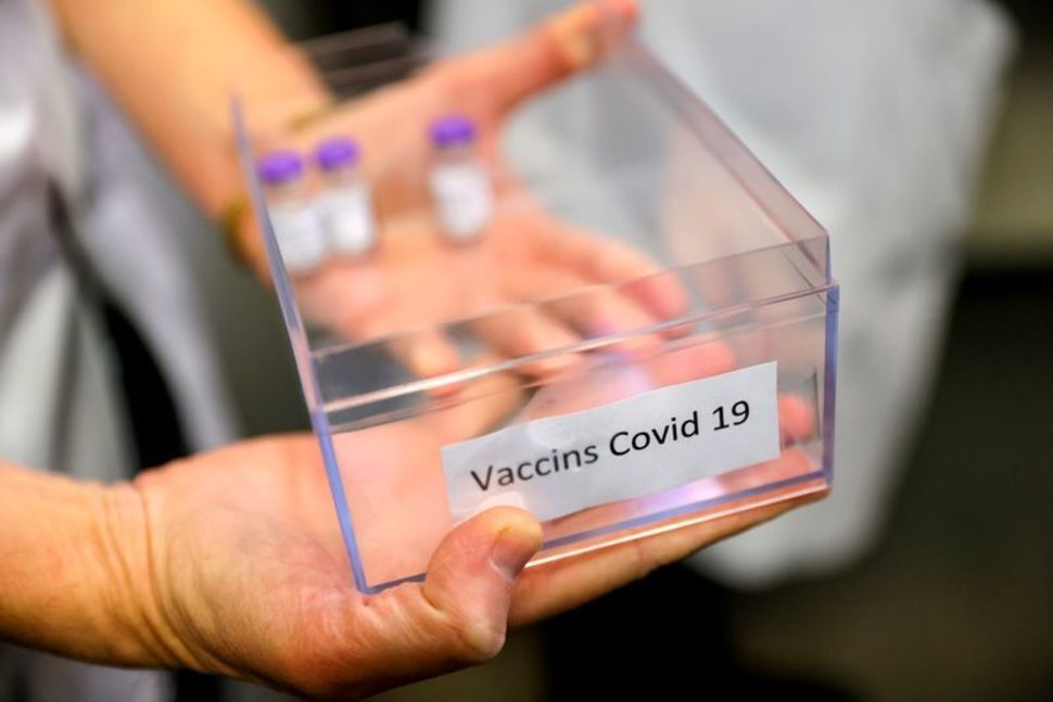 Doses of the Pfizer-BioNTech coronavirus disease (COVID-19) vaccine are prepared at the Rene-Muret hospital in Sevran, on the outskirts of Paris, France 