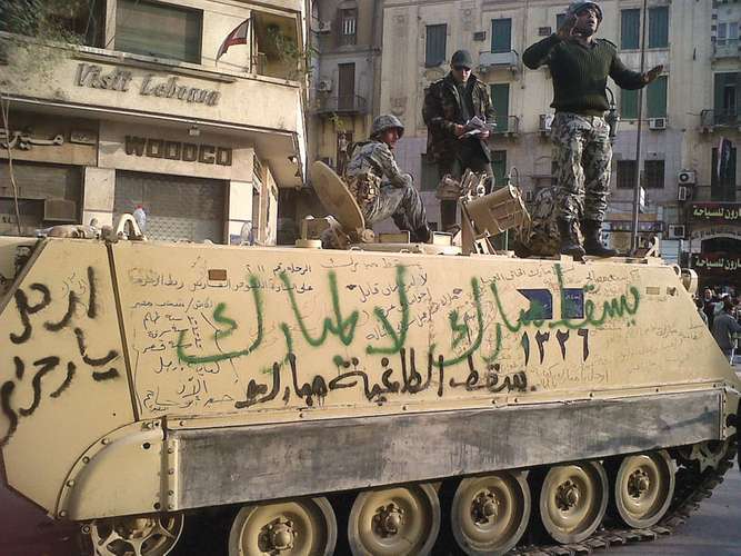 AP_Egyptian personnelcarrier with Anti Mubarak graffiti in Cairo in 2011 