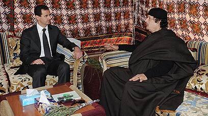 Syrian President Bashar Assad and Libyan leader Muammar Gaddafi meeting in Tripoli in  2010 