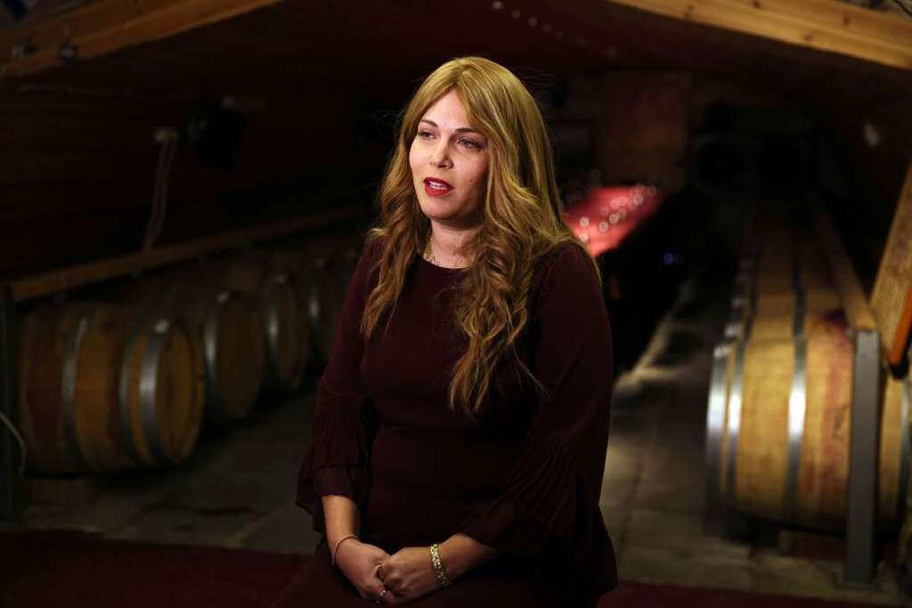 Vered Ben-Sa'adon, the owner of Tura Winery, speaks during her interview with Reuters at the winery in Rehelim, an Israeli settlement in the occupied-West Bank 