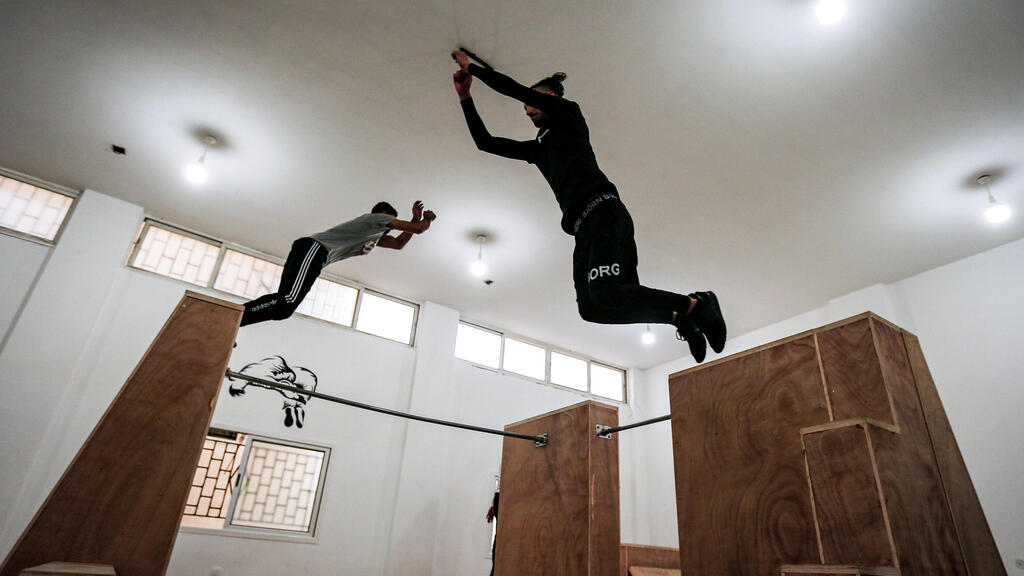 alestinian youths train at the Wallrunners Parkour Academy's training facility in Gaza 