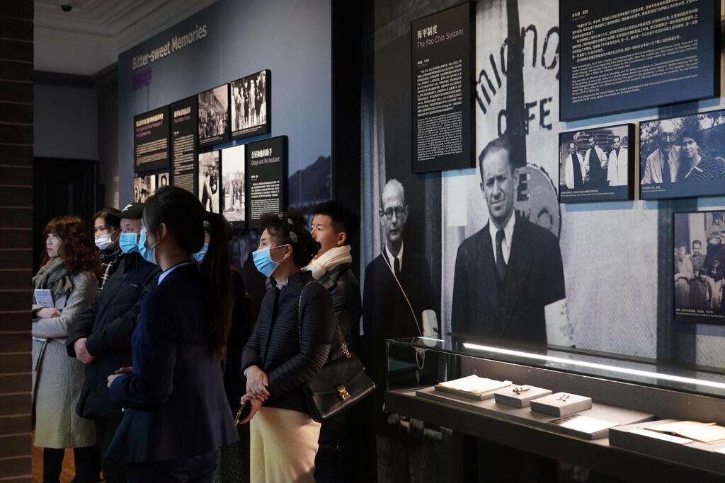 people visiting an exhibition hall at the Shanghai Jewish Refugees Museum 