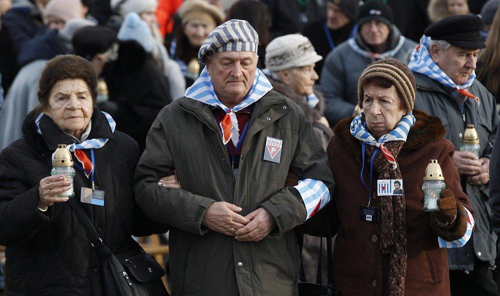 survivors of the Nazi death camp Auschwitz arrive for a commemoration ceremony on International Holocaust Remembrance Day at the International Monument to the Victims of Fascism inside Auschwitz-Birkenau in Oswiecim, Poland 