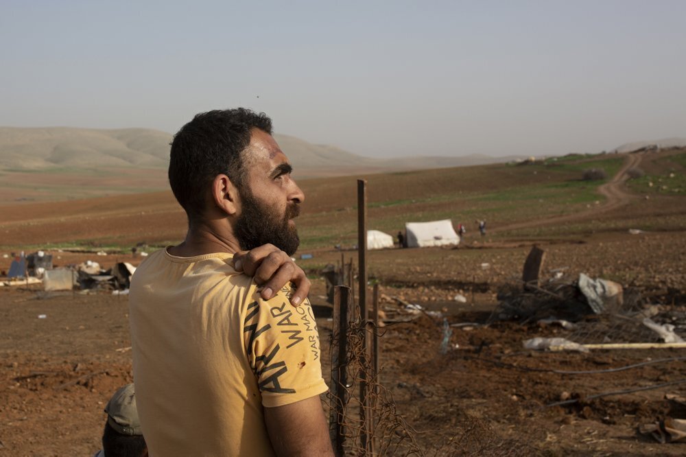 A Palestinian Bedouin rests while rebuilding an animal pen after Israeli troops demolished tents and other structures of the Khirbet Humsu hamlet in the Jordan Valley in the West Bank (Photo: AP) A Palestinian Bedouin rests while rebuilding an animal pen after Israeli troops demolished tents and other structures of the Khirbet Humsu hamlet in the Jordan Valley in the West Bank