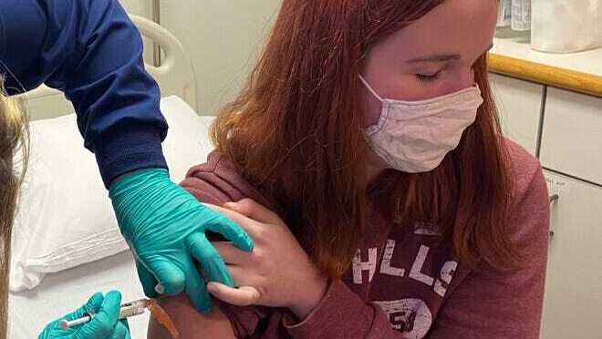 A 16-year-old girl at Cincinnati Children's Hospital was the first local teenager to receive an injection as part of the hospital's clinical trial of the Pfizer COVID-19 vaccine candidate, Oct. 14, 2020