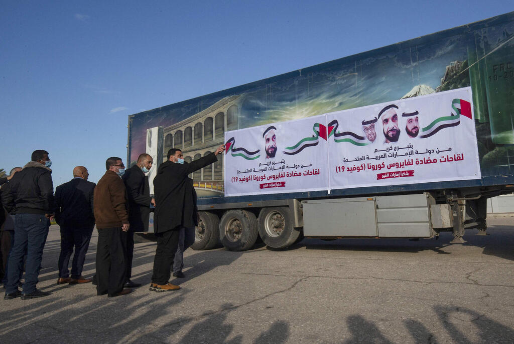 A truck loaded with Russian-made Sputnik V doses from the UAE arrives in the Gaza Strip via the Rafah crossing with Egypt, on February 21, 2021. Around 20,000 coronavirus vaccine doses from the UAE arrived in Gaza today, a delivery reportedly orchestrated by a rival of Palestinian president Mahmud Abbas three months before scheduled Palestinian elections. 