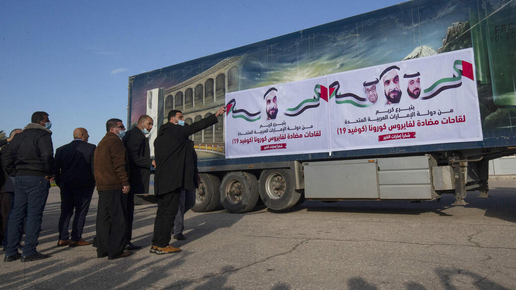 A truck loaded with Russian-made Sputnik V doses from the UAE arrives in the Gaza Strip via the Rafah crossing with Egypt, on February 21, 2021. Around 20,000 coronavirus vaccine doses from the UAE arrived in Gaza today, a delivery reportedly orchestrated by a rival of Palestinian president Mahmud Abbas three months before scheduled Palestinian elections. 