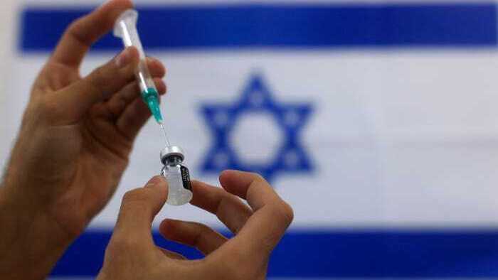 Preparing the Pfizer vaccine for administration 