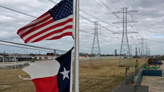 דגלי ארה"ב ו טקסס עמודי חשמל ב יוסטון