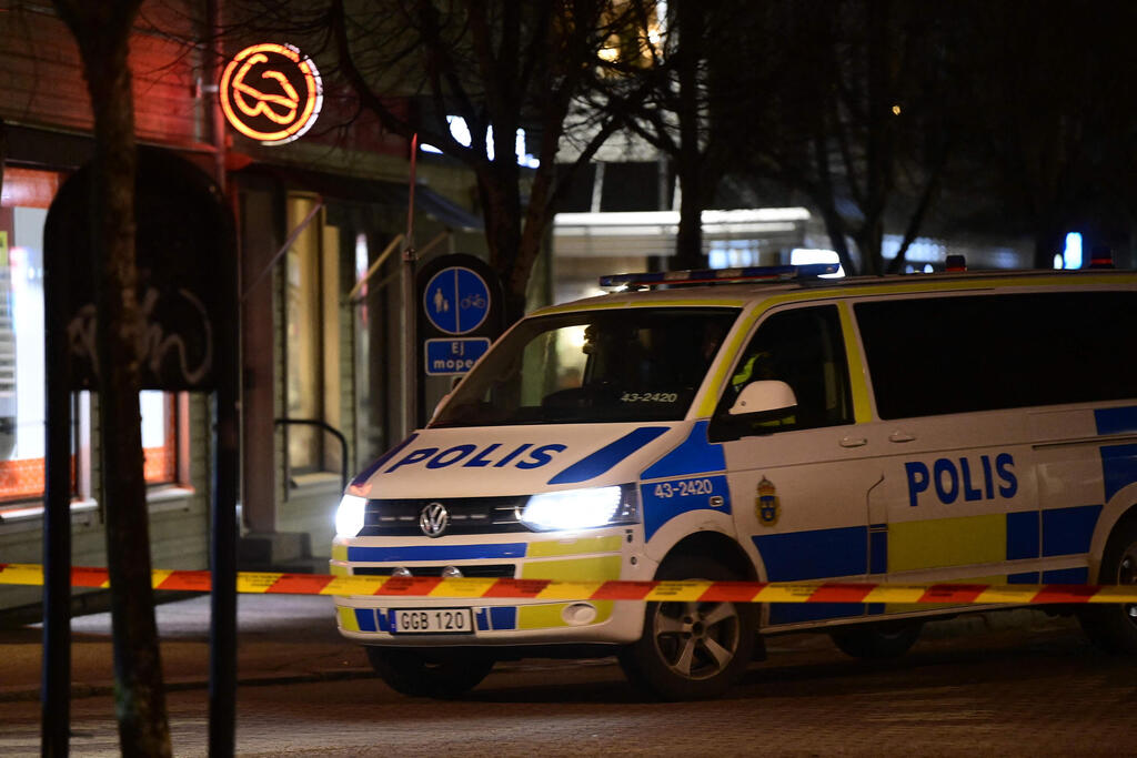 Police cordone off the scene of an attacked injuring eight people in the Swedish city of Vetlanda	
