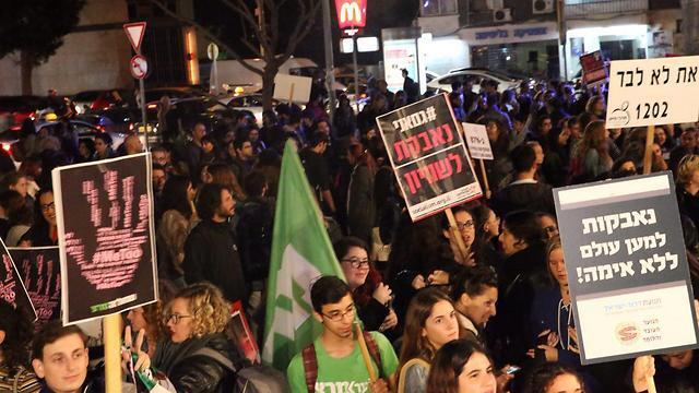 Israelis hold a Tel Aviv rally to protest violence against women 