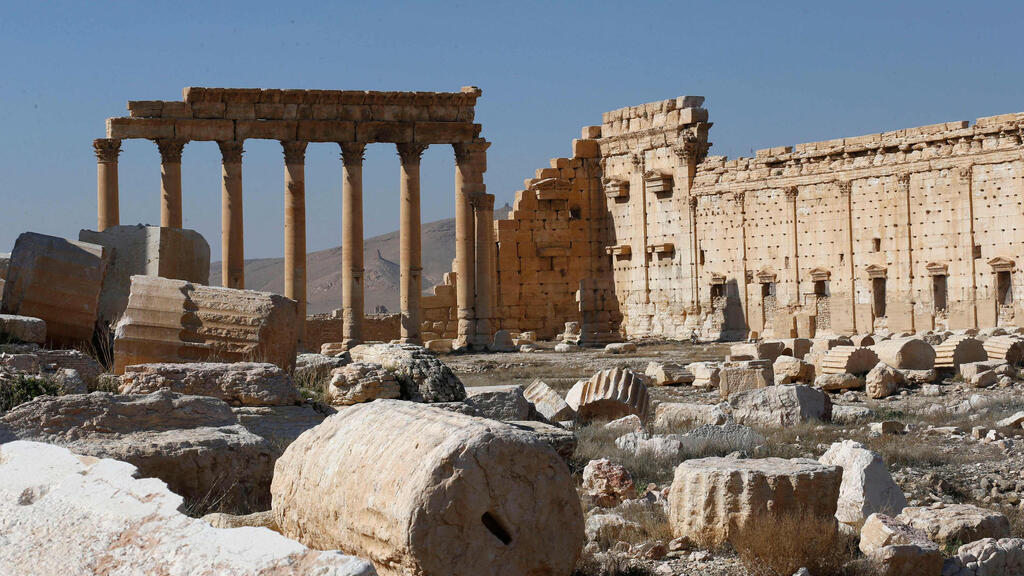  picture shows the damaged Temple of Bel and surrounding columns in Syria's Roman-era ancient city of Palmyra