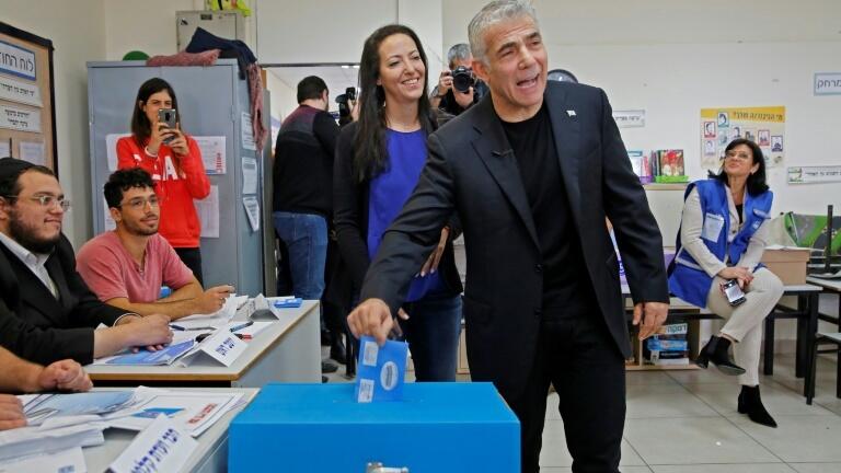 Lapid and his wife Lihi voted at a polling station in Tel Aviv during parliamentary elections in March last year (Photo: AFP) Lapid and his wife Lihi voted at a polling station in Tel Aviv during parliamentary elections in March last year