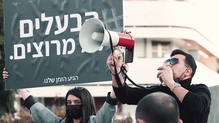 Young Israeli Arabs stage a flash mob in Tel Aviv to protest violence in their community