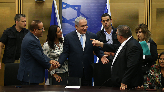 Benjamin Netanyahu with members of his Likud party 