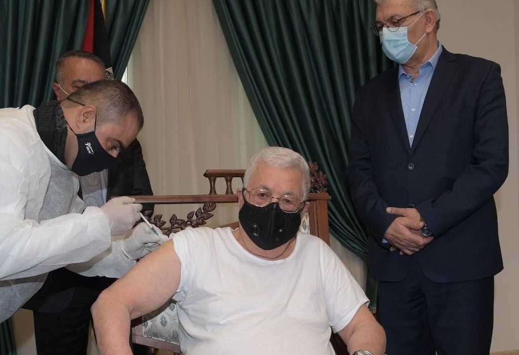 Palestinian Authority President Mahmoud Abbas receives his first shot of COVID-19 vaccine 