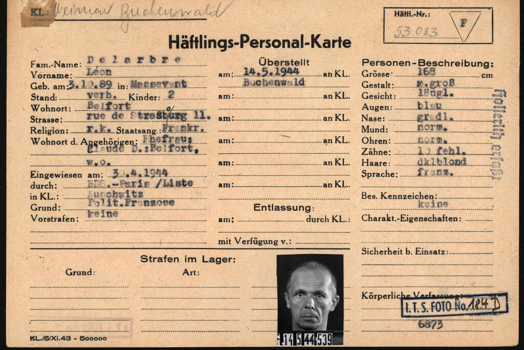 This reproduction handed out on March 22, 2021 by the Arolsen Archives shows the prisoner card (Haeftlings-Personal-Karte) of Frenchman Leon Delarbre who was kept imprisoned by the Nazis in the Auschwitz and Buchenwald concentration camps