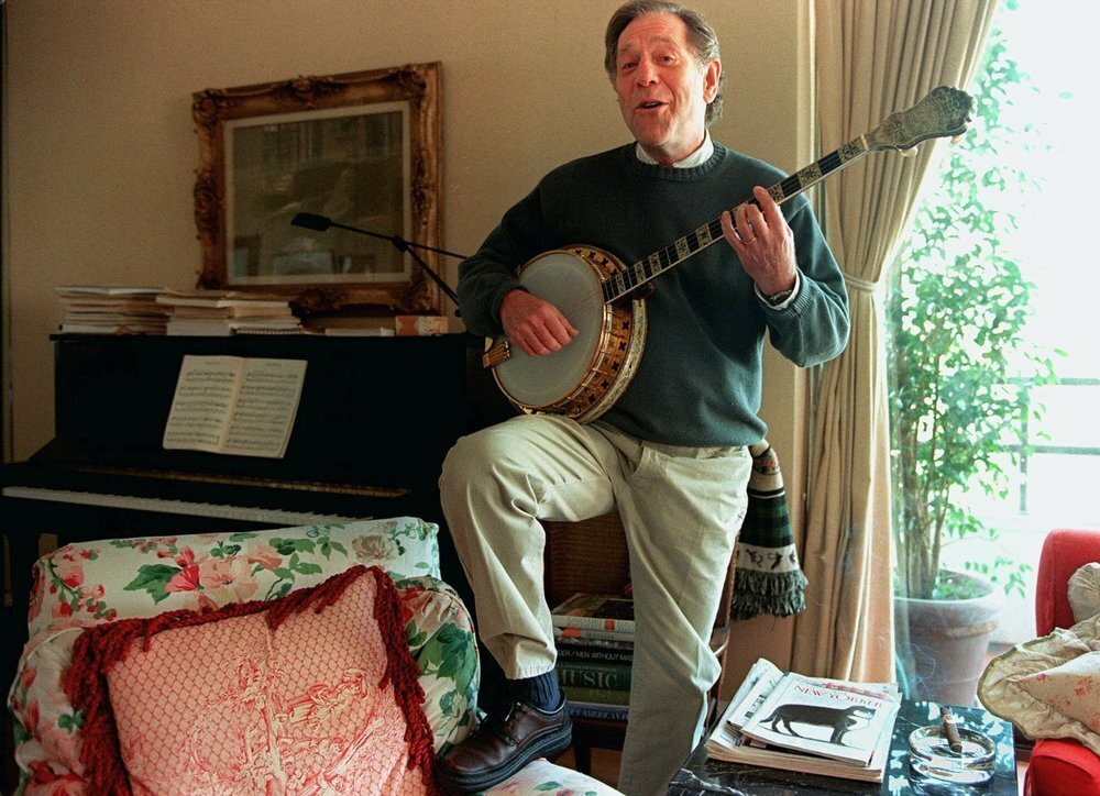 George Segal plays the banjo at his home in Los Angeles, Feb. 1997 