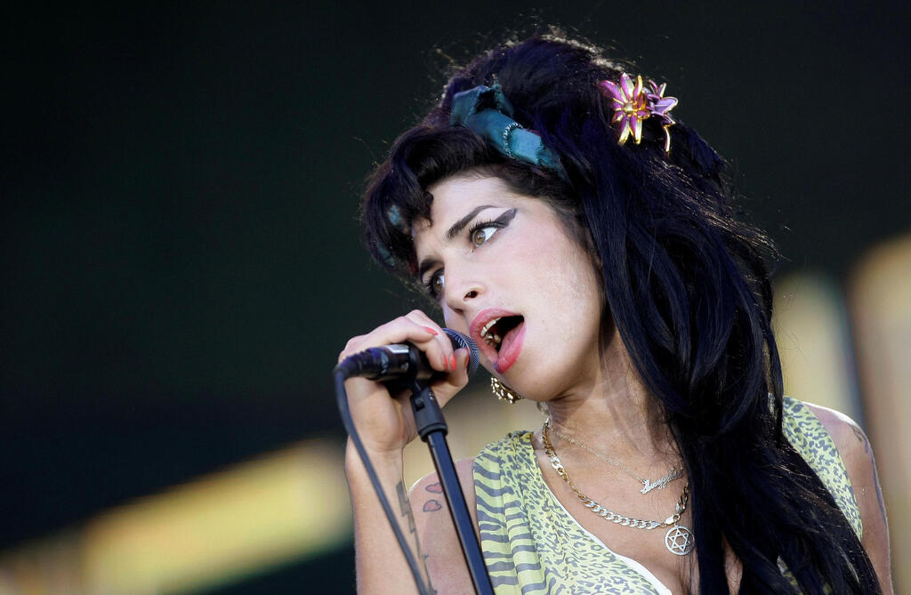 British singer Amy Winehouse performs during the "Rock in Rio" music festival in Arganda del Rey, near Madrid, July 4, 2008