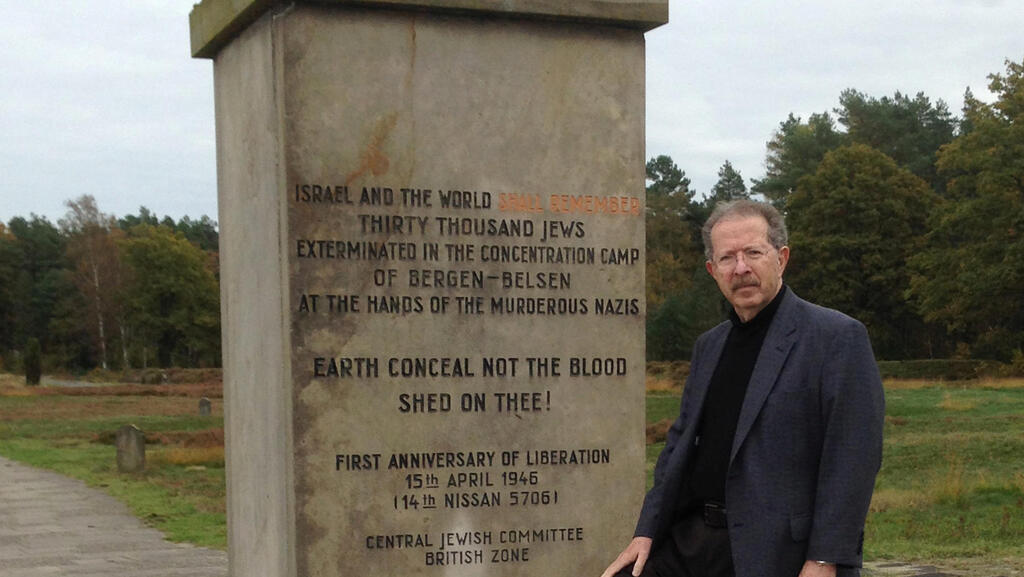 Menachem Rosensaft, an American Jew, stands before a monument to the victims of the Bergen-Belsen concentration camp in Germany October 26, 2014