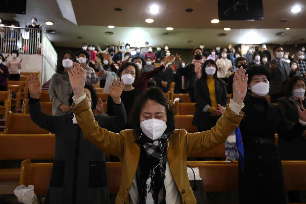 Christians attend an Easter service with social distancing at the Yoido Full Gospel Church in Seoul, April 4, 2021 