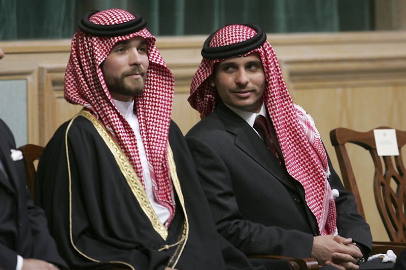 Prince Hamzah Bin Al-Hussein, right, and Prince Hashem Bin Al-Hussein, left, half brothers of King Abdullah II of Jordan, attend the opening of the parliament in Amman, Jordan 