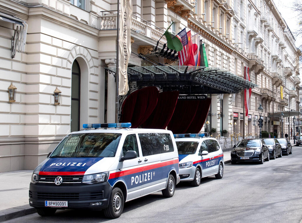 Austrian police outside the Vienna hotel hosting talks on renewing the Iran nuclear deal this month 
