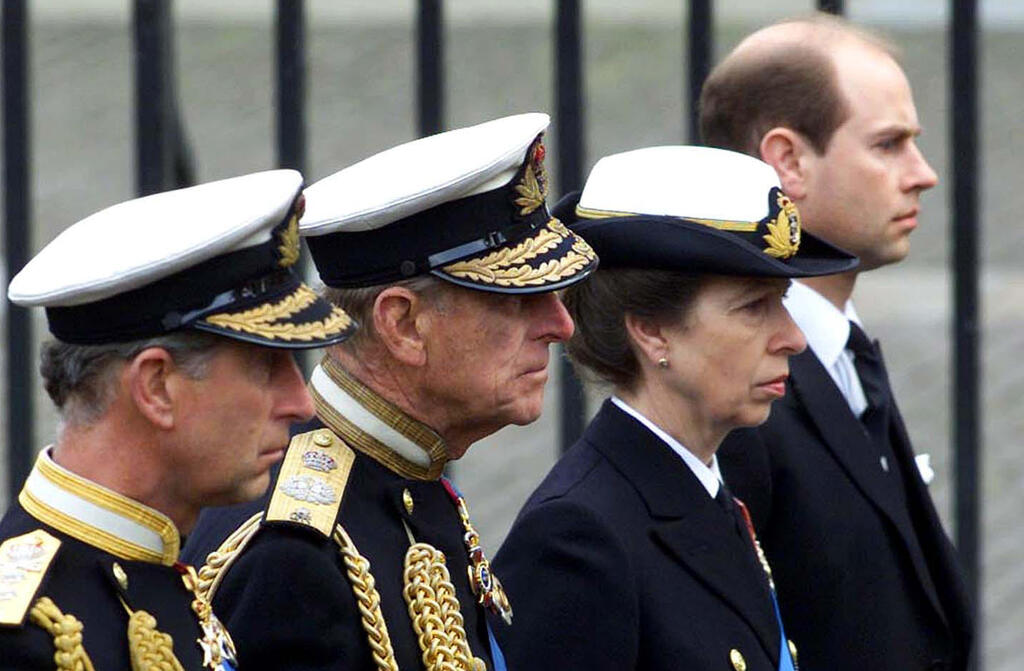 L-R: Prince Charles, Prince Philip, Princess Anne and Prince Edward follow the coffin of the Queen Mother en route to her funeral in Westminster Abbey, April 2002 