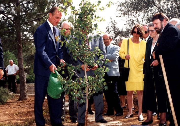 Prince Philip planting a tree for his mother Princess Alice at Yad Vashem Holocaust Museum in Jerusalem in 1994 