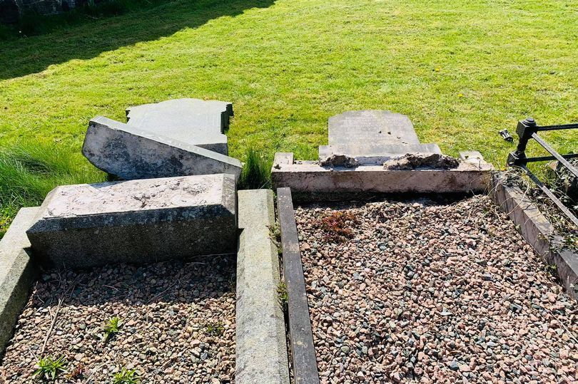 The damaged Jewish graves at the Belfast City Cemetery in Northern Ireland