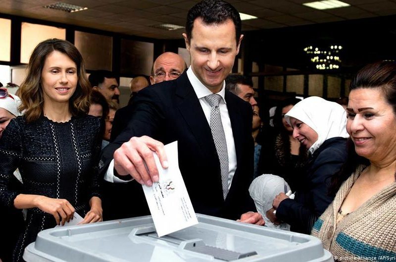 Syrian President Bashar al-Assad casts a ballot in a presidential election
