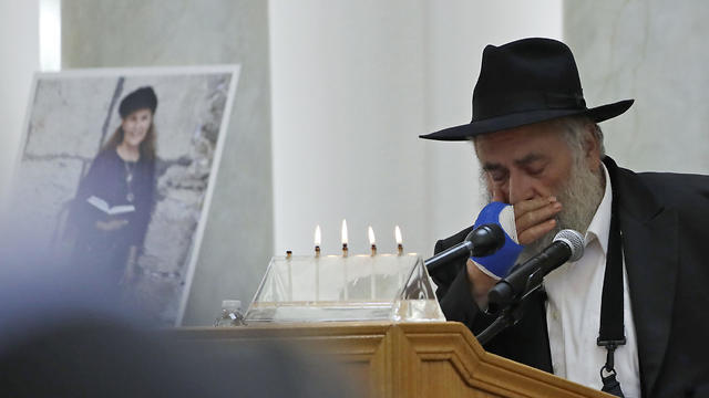 Rabbi Yisroel Goldstein of Chabad of Poway synagogue presides over a memorial service for congregant Lori Gilbert, who was shot dead in an anti-Semitic attack at the California house of prayer in April 2019 