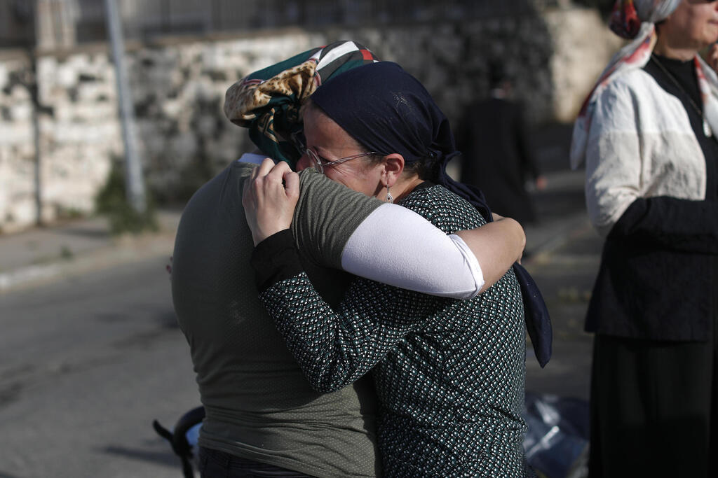 Family members mourn the passing of Yehuda Rubin —one of 45 people who have lost their lives in the Mount Meron stampede 