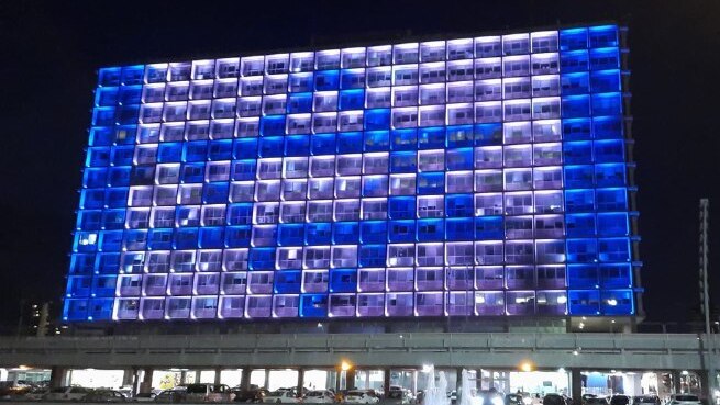 Tel Aviv city hall is lit up with the Israeli flag in solidarity with the victims of the Mount Meron tragedy  
