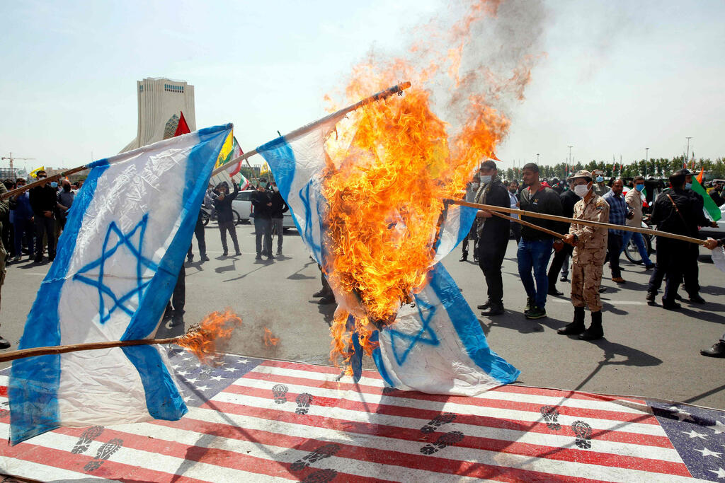 שריפת דגלי ישראל כחלקי מאירועי יום ירושלים בטהרן