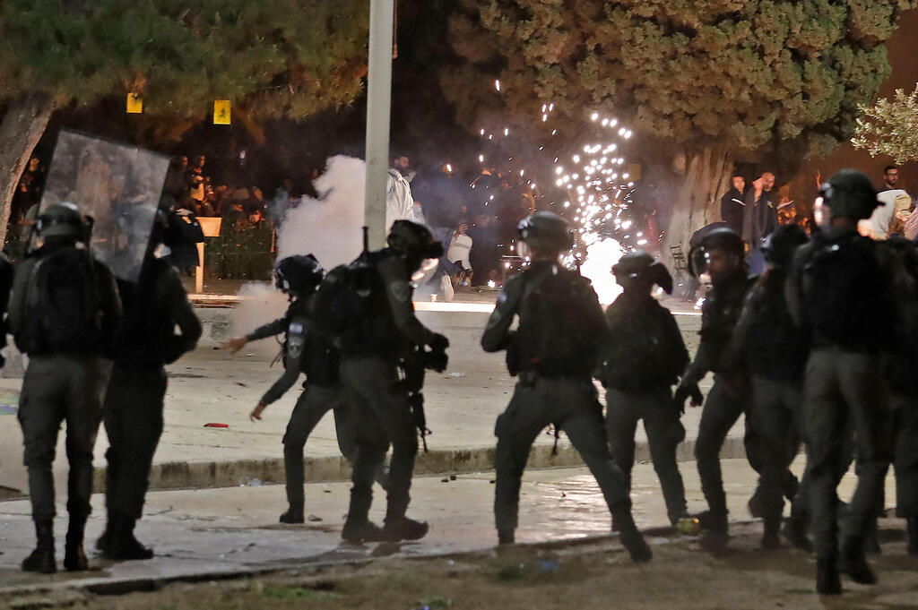 Israeli riot police deployed to quell riots in the Al-Aqsa mosque compound last month 