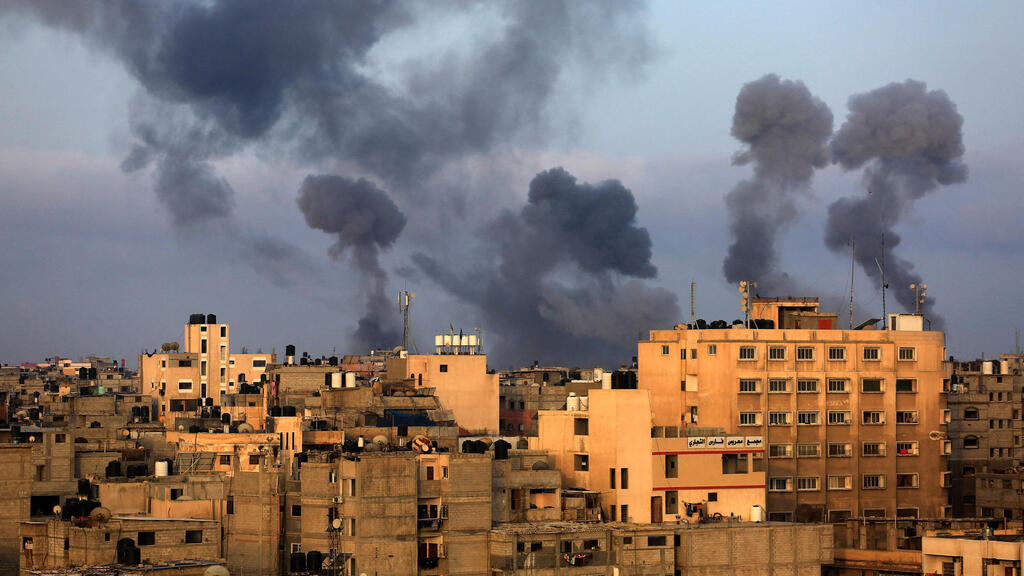 Smoke rises after an IDF strike on Gaza following rocket fire from the Strip at Israeli communities on Tuesday 