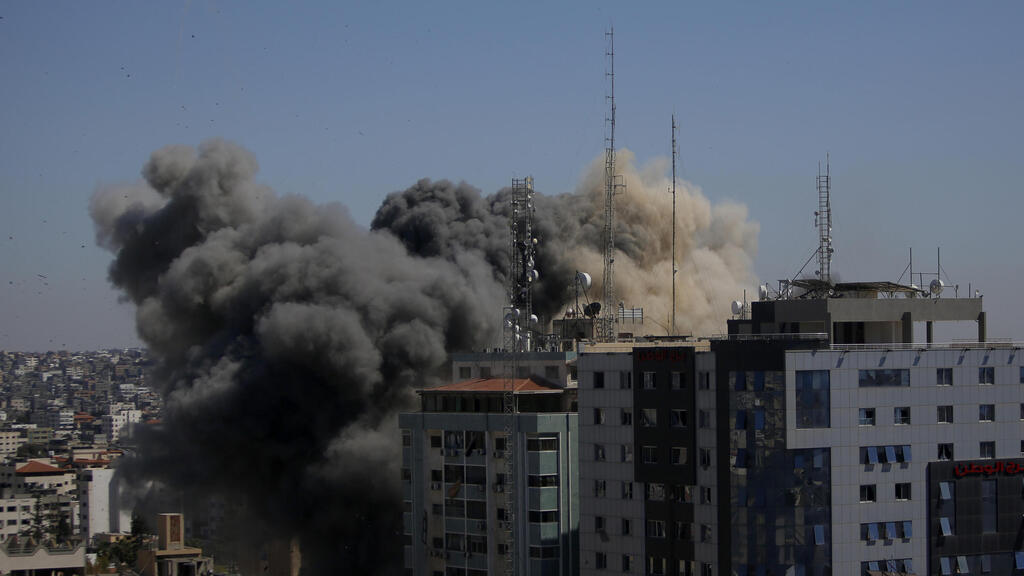 IDF destroys Gaza high-rise housing foreign media in Gaza in 2021      