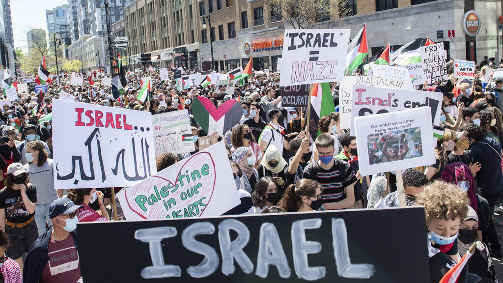 People in Montreal attend a demonstration on Saturday, May 15, 2021, to protest Israel's military actions in Gaza 
