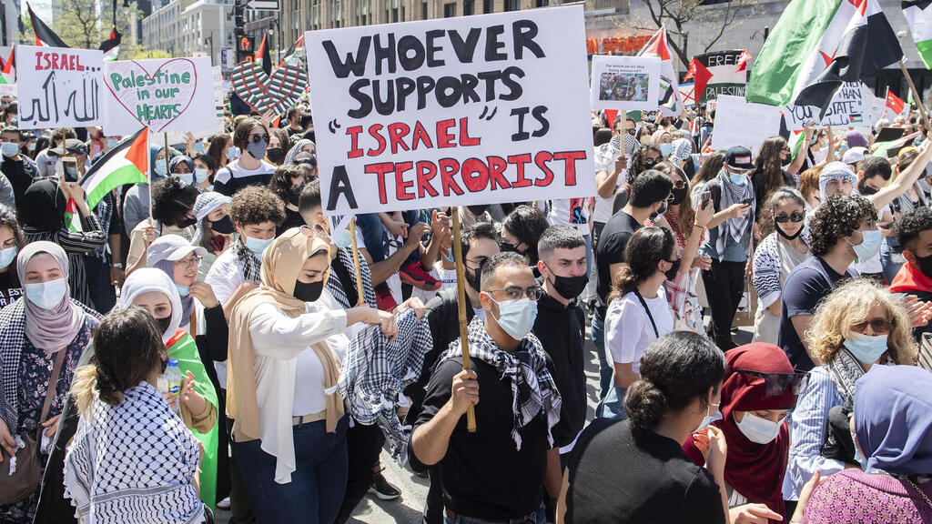 People in Montreal attend a demonstration on Saturday, May 15, 2021, to protest Israel's military actions in Gaza 