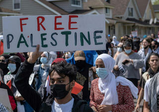 Marchers protest Israeli strikes on Gaza during Biden visit to Michigan 