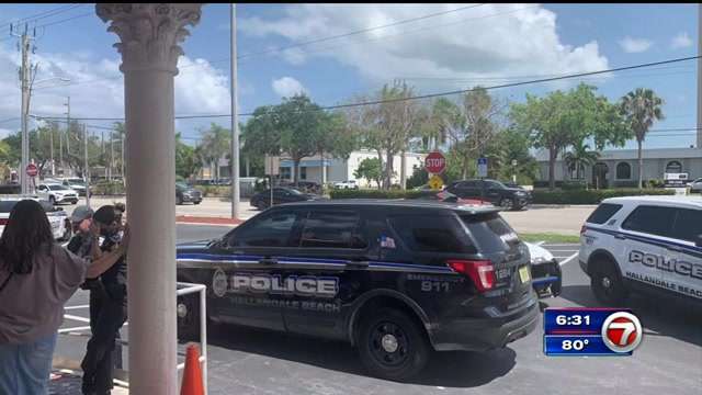 Police outside the synagogue in Hallandale Beach, Florida after a man hurled expletives, feces at passersby in a suspected anti-Semitic attack Police outside the synagogue in Hallandale Beach, Florida