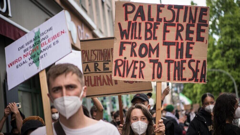 Pro-Palestinian protesters in Berlin take part in a demonstration against Israel amid the fighting in Gaza between the Israeli military and Hamas terror group, May 15, 2021.