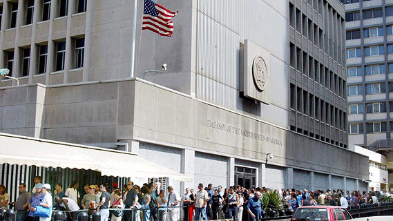 Israelis line up outside the U.S. embassy in Tel Aviv to apply for entry visas in 2019 