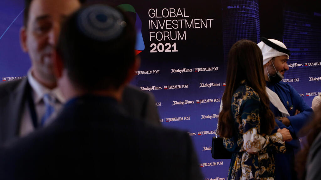 Attendees gather during the Global Investment Forum 2021 in the Gulf Emirate of Dubai, 