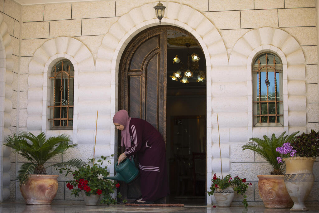 Sanaa Shalaby, estranged wife of Muntasser Shalaby outside her home on the West Bank 